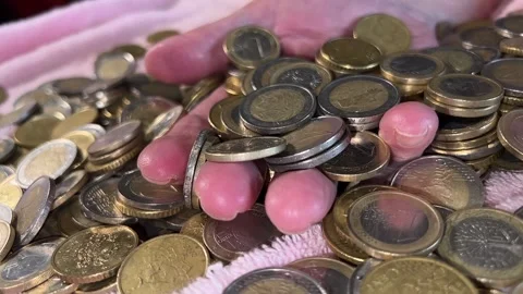 Hand covered by money Stock Footage 225769714