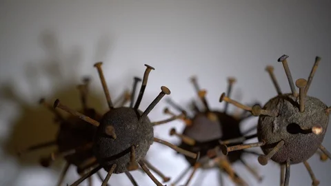 Hand Crafted Corona Virus Models in Group with 360 Degree Turn 動画素材 129557970
