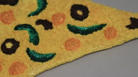 Hand-crafted textile pizza slice art Stock Footage 337505039