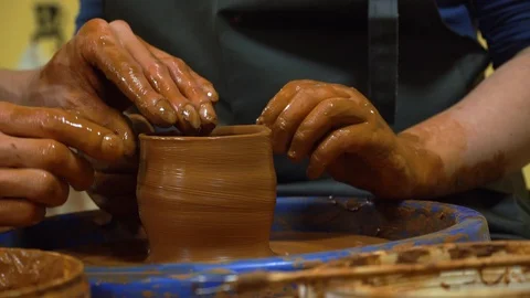 Hand Crafting Pottery. Traditional techniques of creating pots. Potter hands wor 스톡 동영상 99772673