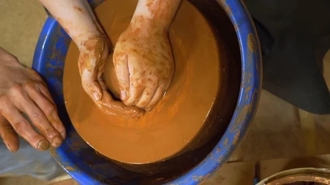 Hand Crafting Pottery. Traditional techniques of creating pots. Potter hands wor 動画素材 99773314