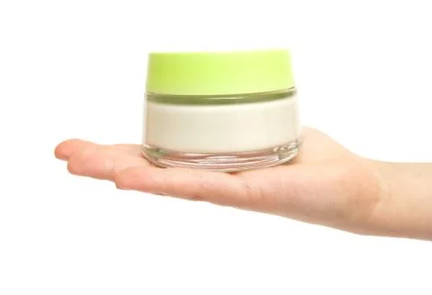 Hand with cream pot Stock-Fotos