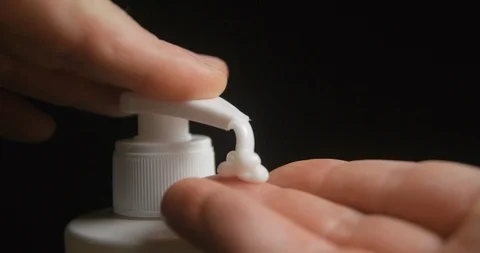 Hand cream slow motion in studio Stock Footage 94741935