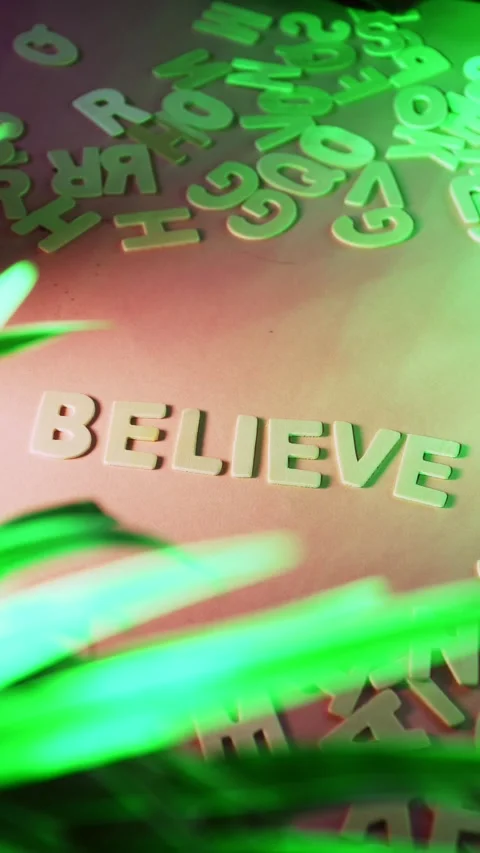Hand creating the word believe concept Stock Footage 326363456