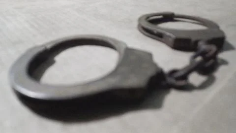 Hand cuffs Stock Photos