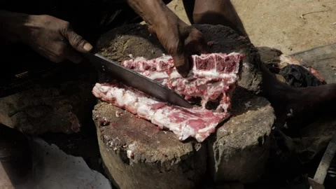 Hand-Cut Beef - Tenderizing the Meat with Skill Stock Footage 320944659