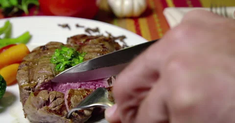 Hand Cut Roasted Filet Mignon And Vegetables Stock Footage 243459826