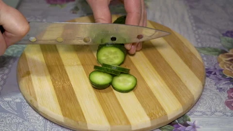 Hand Cuts Cucumber Stock-Footage 195311728