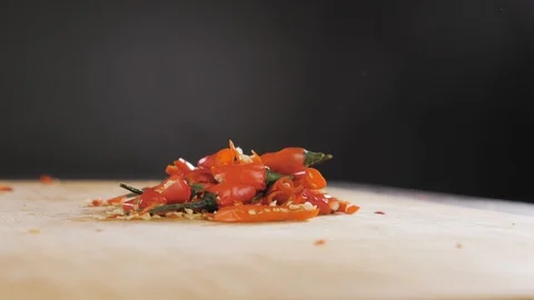 Hand cuts red hot pepper Stock Footage 117520334