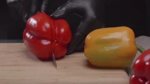 Hand cutting bell pepper. Stock Footage 313971392