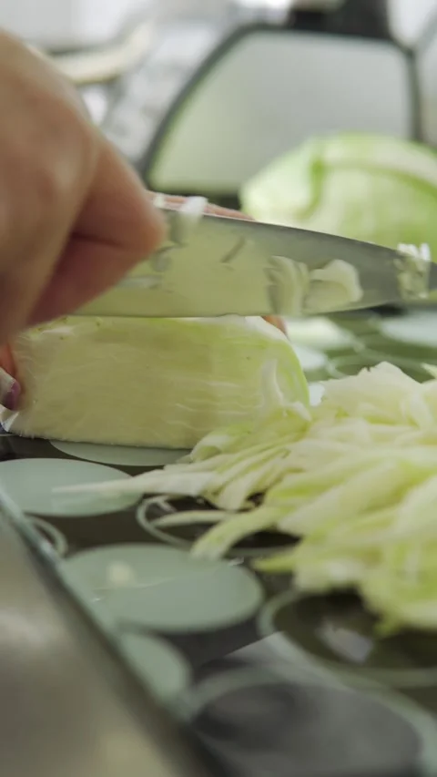 Hand cutting cabbage 01 Video stock 246241708