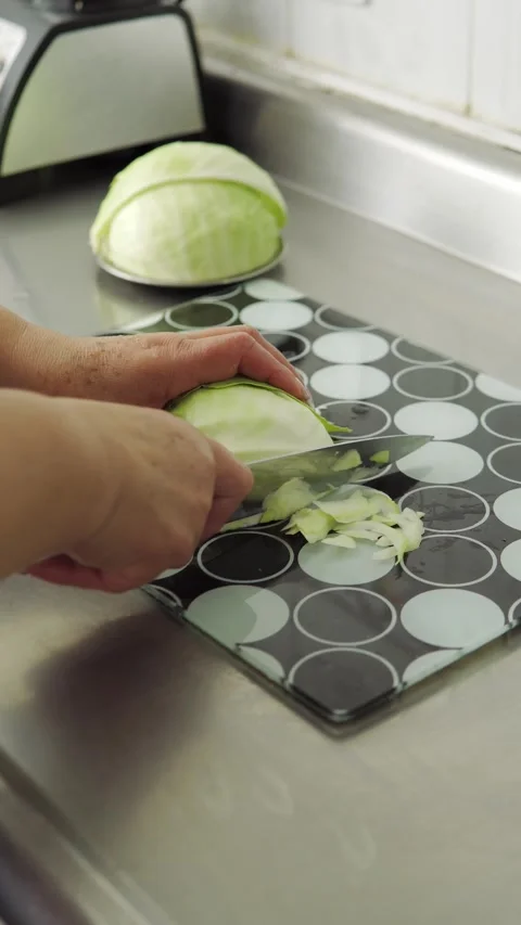 Hand cutting cabbage Video stock 247084589