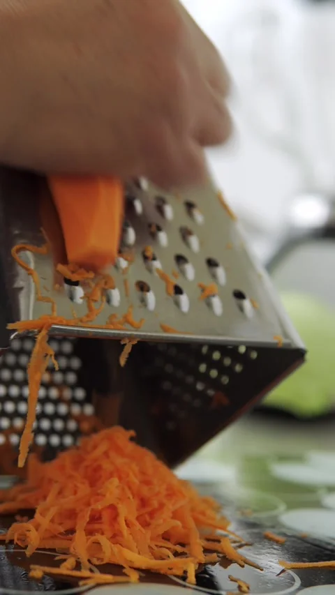 Hand cutting carrot Video stock 247084603