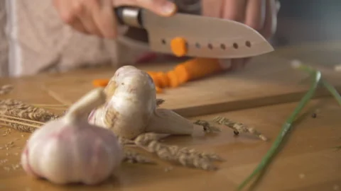 Hand cutting carrots close up Stock Footage 142026148