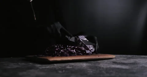Hand cutting fresh red cabbage on Cutting Board Video stock 148245536