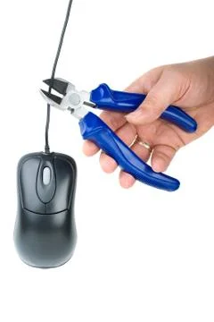 Hand cutting mouse cable Stock Photos