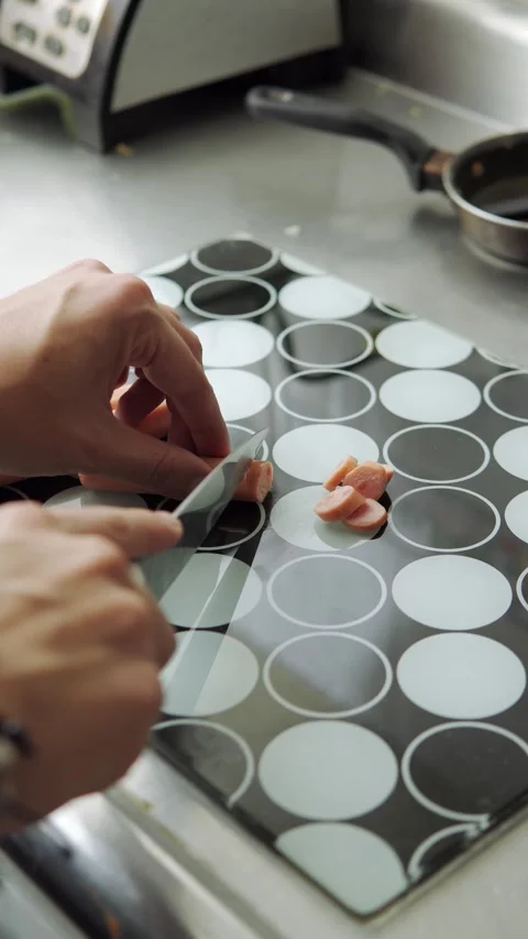 Hand cutting sausage Video stock 246241644