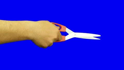 Hand cutting with scissors isolated blue screen 動画素材 73821485