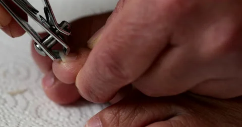 Hand Cutting Toenails Stock Footage 140628872