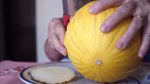 Hand cutting white melon from southern Italy Stock Footage 287136115