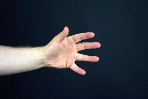 Hand in the dark Stock Photos