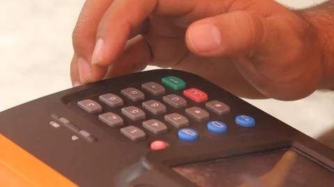 Hand Data Entry on a Numeric Keypad Portable Machine Stock Footage 86611590