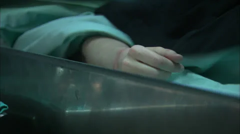 Hand of Dead Body on Morgue Table HD Video Stock Footage