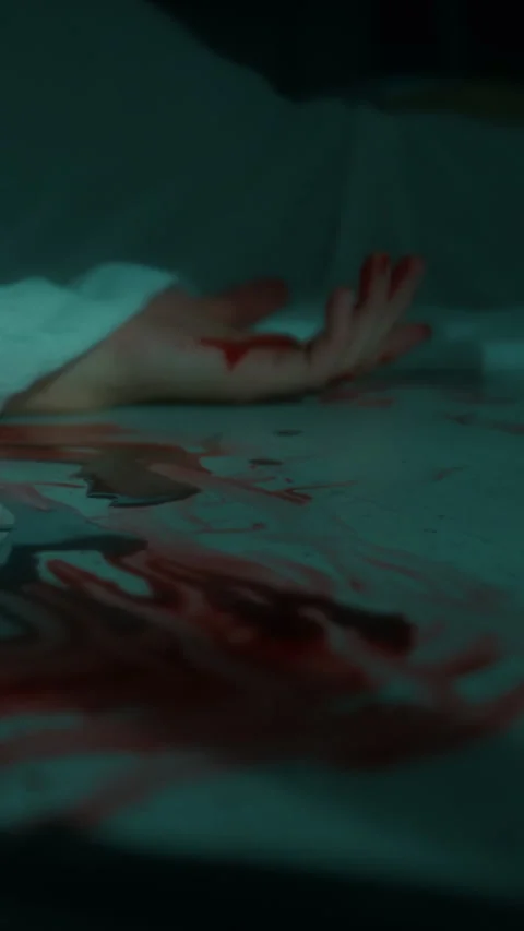 Hand of Dead Victim Ling on Floor near Blood Pool Stock Footage 284204939