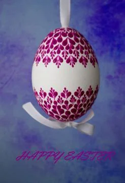 Hand-decorated easter egg with wax and  inscription Happy Easter Stock Photos
