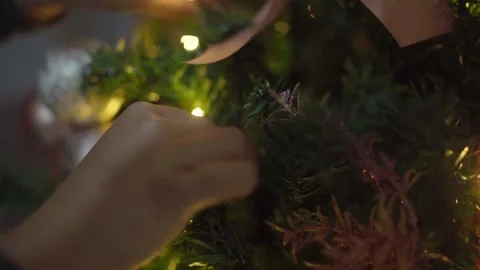 Hand Decorating a Christmas Tree Stock Footage 294663568