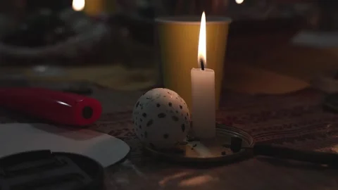 Hand Decorating Easter Egg With Wax Candle Stock Footage 339296692