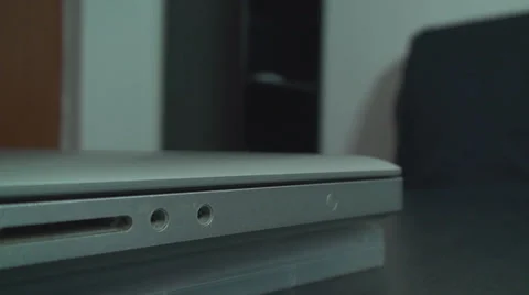 Hand Detail Of A Man Checking The Battery Indicator On A Laptop Still-Shot Stock-Footage 34045718