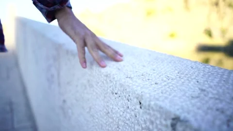Hand detail touching the stone Stock Footage 144975902
