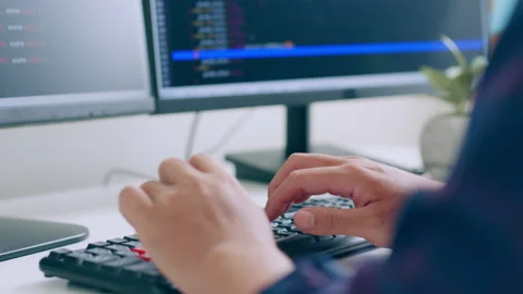 Hand of developer programmer, software engineer typing on computer keyboard Stock Footage 221085388