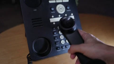 Hand Dialing Number On Black Office Telephone Stock Footage 341718989