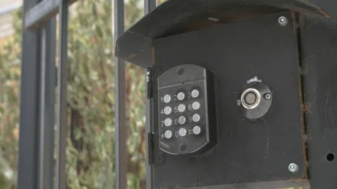 Hand dials number of apartment on intercom system Stock Footage 70216367