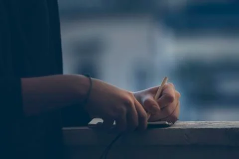 Hand on diary Stock Photos