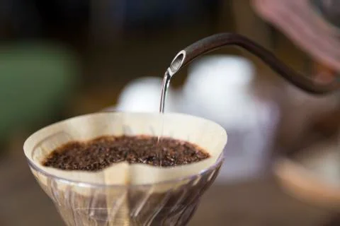 Hand dirp coffee and drop the water Stock Photos