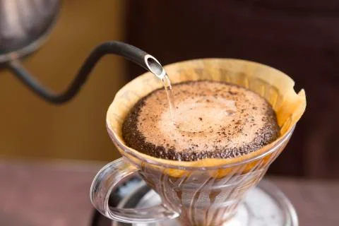 Hand dirp coffee and drop the water Stock Photos