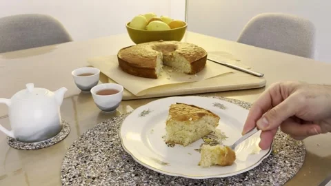 Hand Dividing Simple Cake Slice For Sharing Close Up Stock Footage 320778963