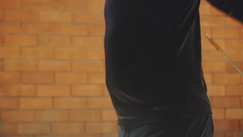 Hand doing jump rope Stock Footage 127633985