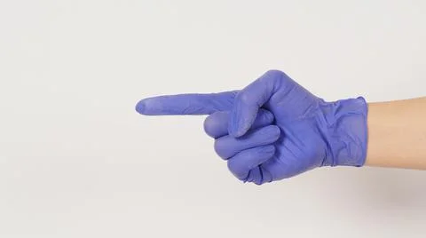 Hand is doing pointing finger (side view) hand sign on white background. Hand Stock Photos