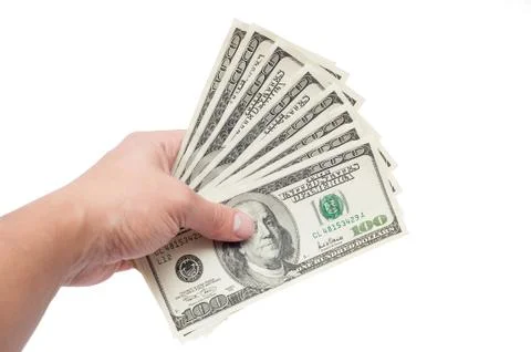 Hand with dollars isolated on a white background Stock Photos
