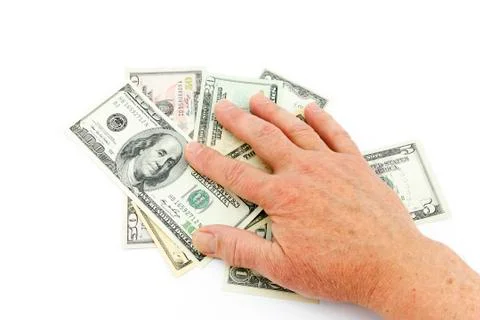 Hand on dollars Stock Photos
