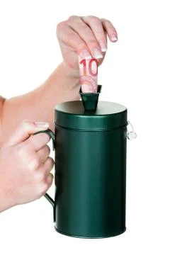 Hand with donation box Stock Photos