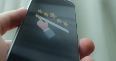 Hand is dragging a selector choosing a rating, presentation Stock Footage 313437602