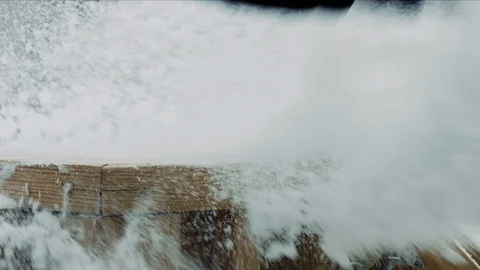 Hand dramatically swipes snow off of balcony railing during snowstorm Stock Footage 102965226