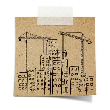 Hand draw  of city development with crane, and building background  on note t Stock Photos