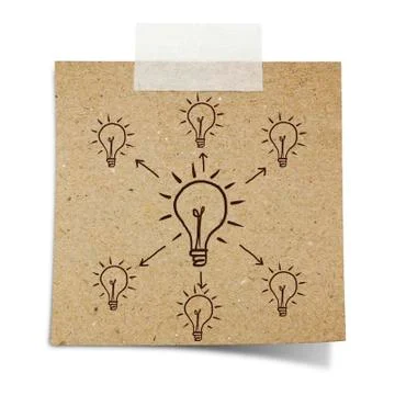 Hand draw light bulbs on note taped recycle paper Stock Photos