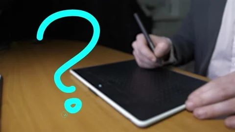 Hand draw on tablet with graphics screen question mark blue hands pen Stock Footage 235226349